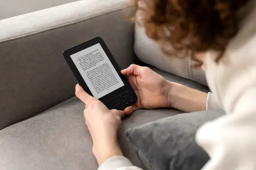 Person reading ebooks on a tablet